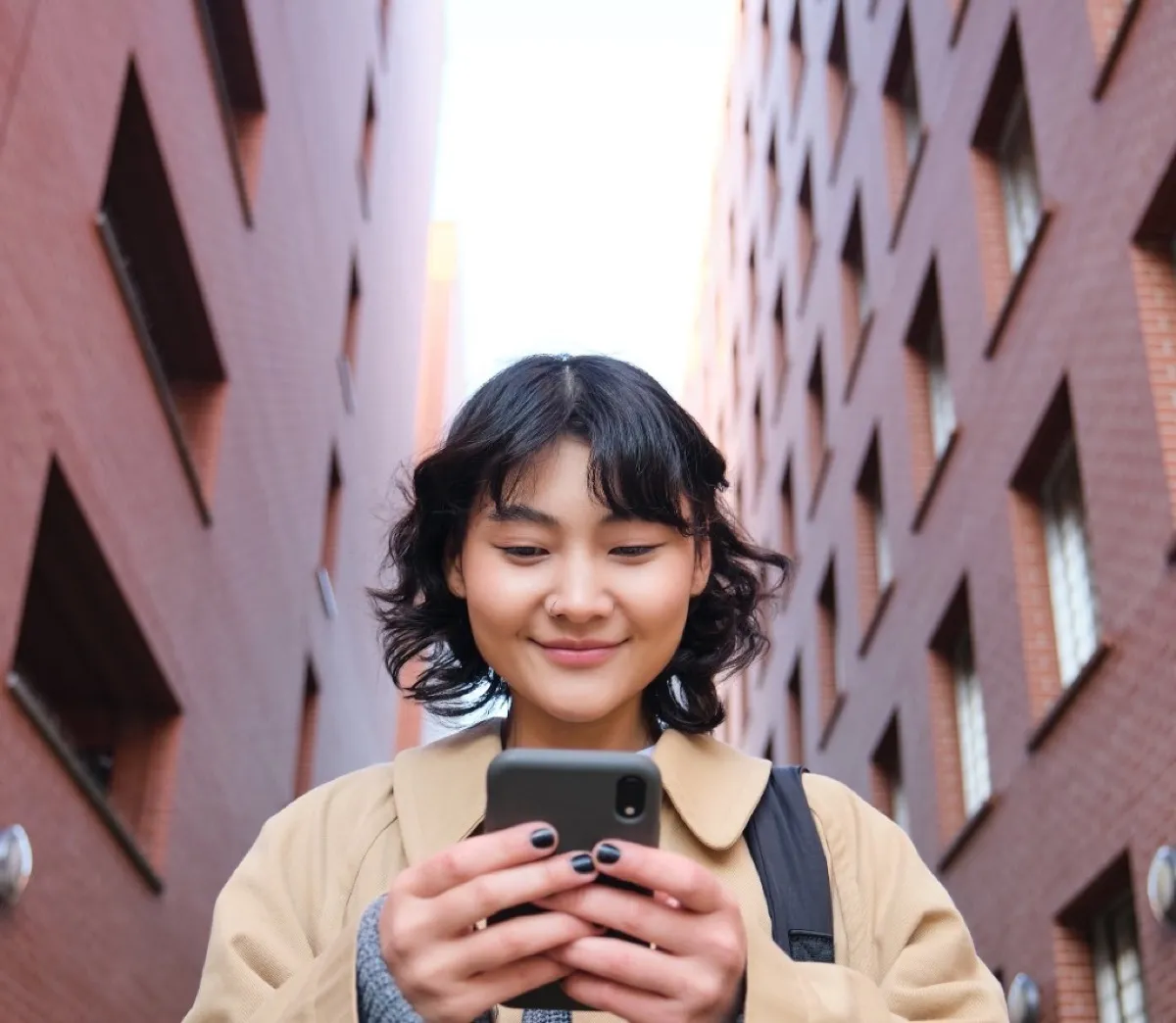 Student using phone on campus